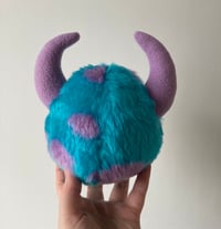 Image 2 of Small blue and lilac horned monster plushie