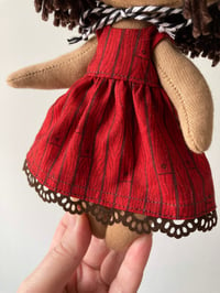 Image 3 of Red cabin doll.