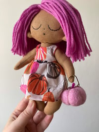 Image 4 of Pink pumpkin doll.