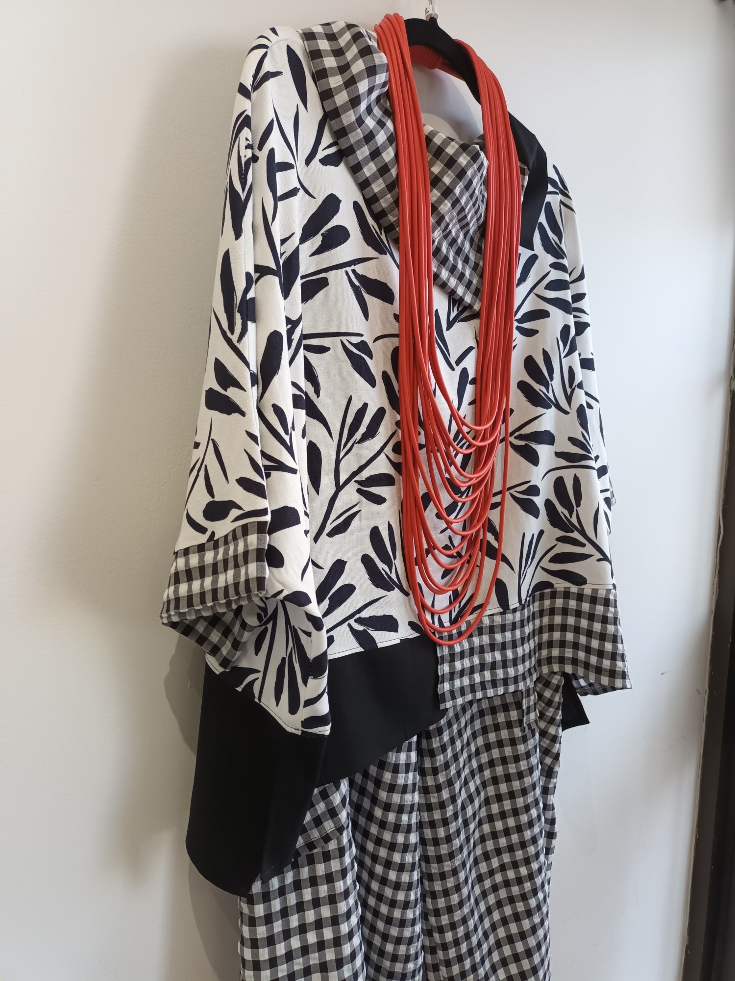 Image of black and white top