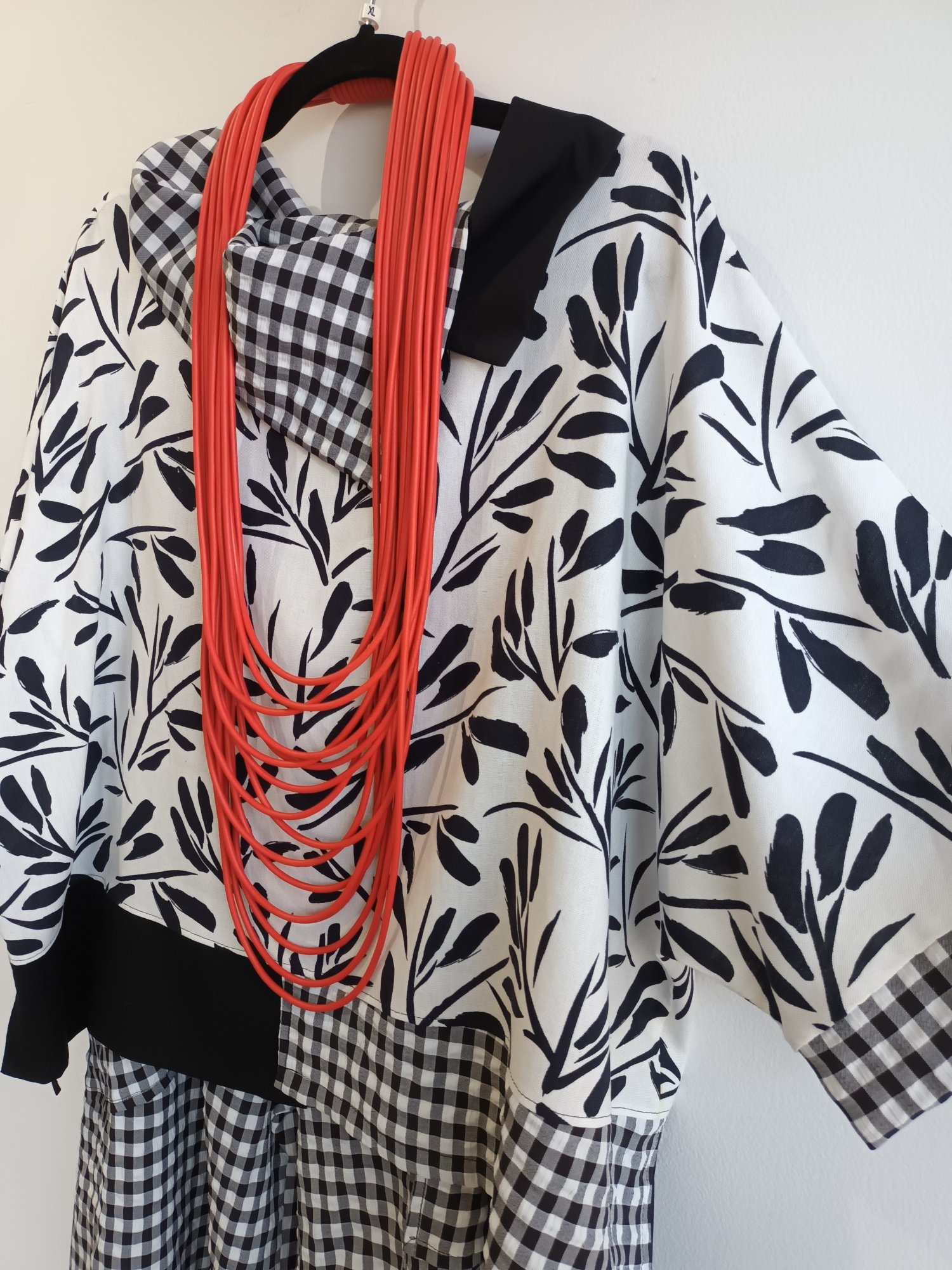 Image of black and white top