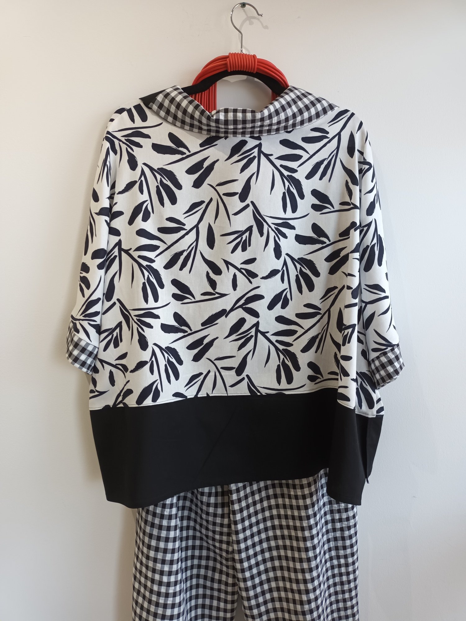 Image of black and white top