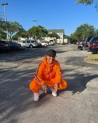 Image 4 of "Neon Pulse" Orange, Black and Reflective Men's Tech Suit