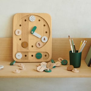 Image of Reloj de juguete de madera.