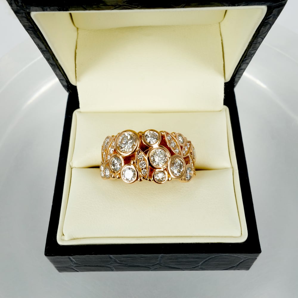 Image of 18ct rose gold large cocktail ring, using clients re-purposed diamonds. 