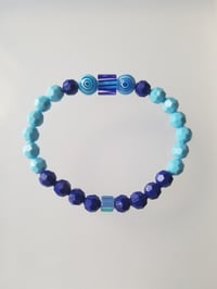 Image 1 of Catchy blue eyes