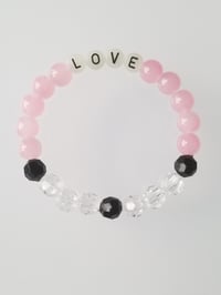 Image 1 of Glow in the dark word LOVE 
