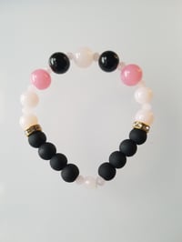 Image 1 of Black queen