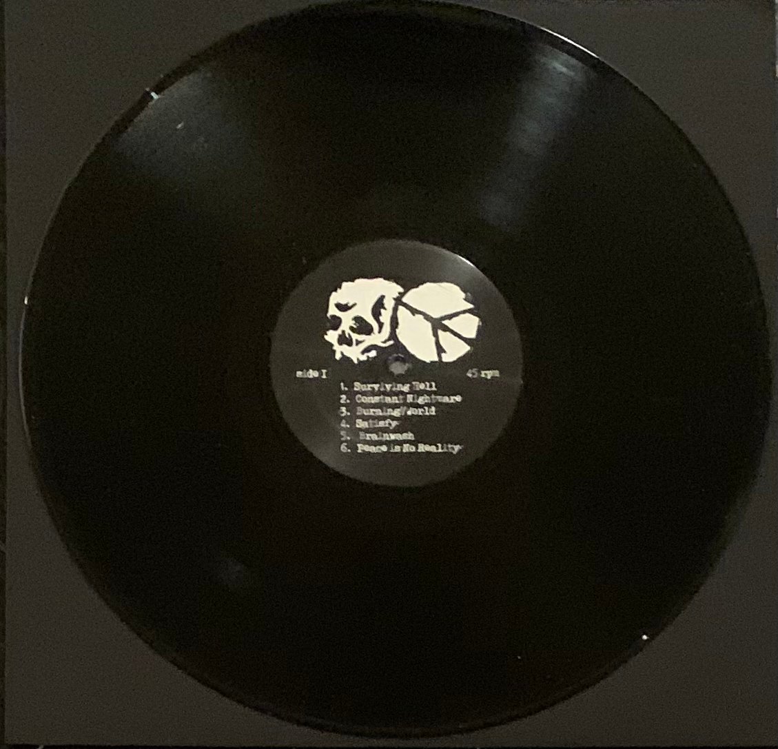 Burning//World Peace is No Reality black vinyl 12-inch record