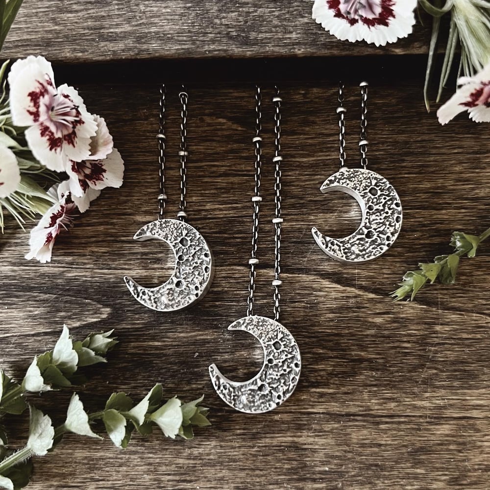Image of Hollow Form Crescent Moon Charms
