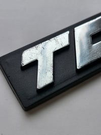 Image 2 of Tom's Plastic Emblem 