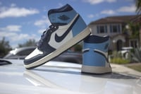 Air Jordan 1 Retro High OG "Obsidian/University Blue"