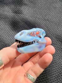 Image 3 of Mirage (cfl) T-Rex skull pendant.