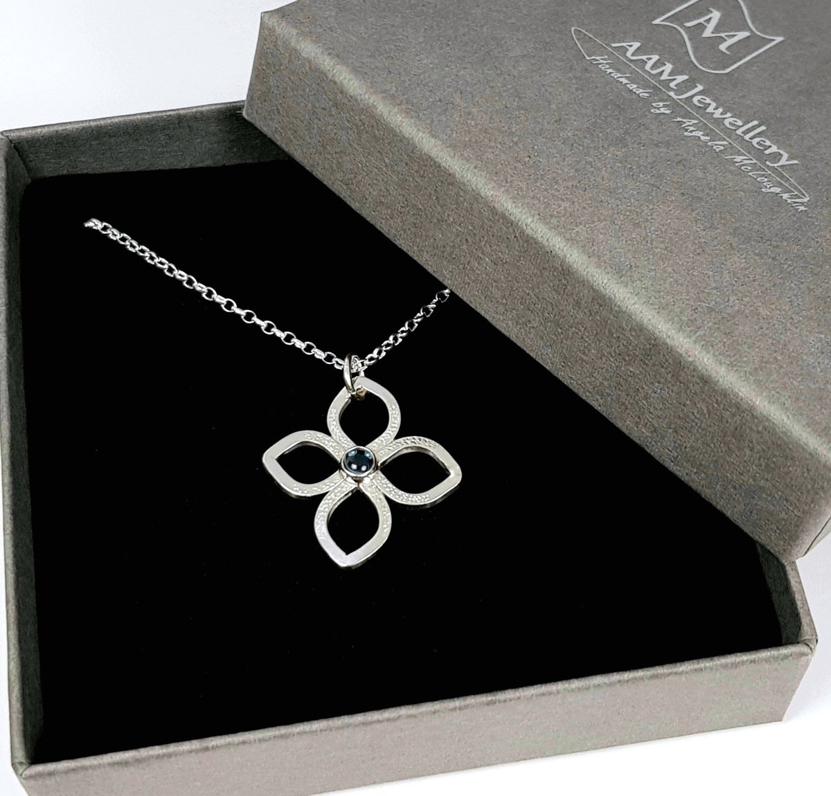 Image of Sterling Silver Flower Necklace, Blue Topaz Pendant, November Birthstone