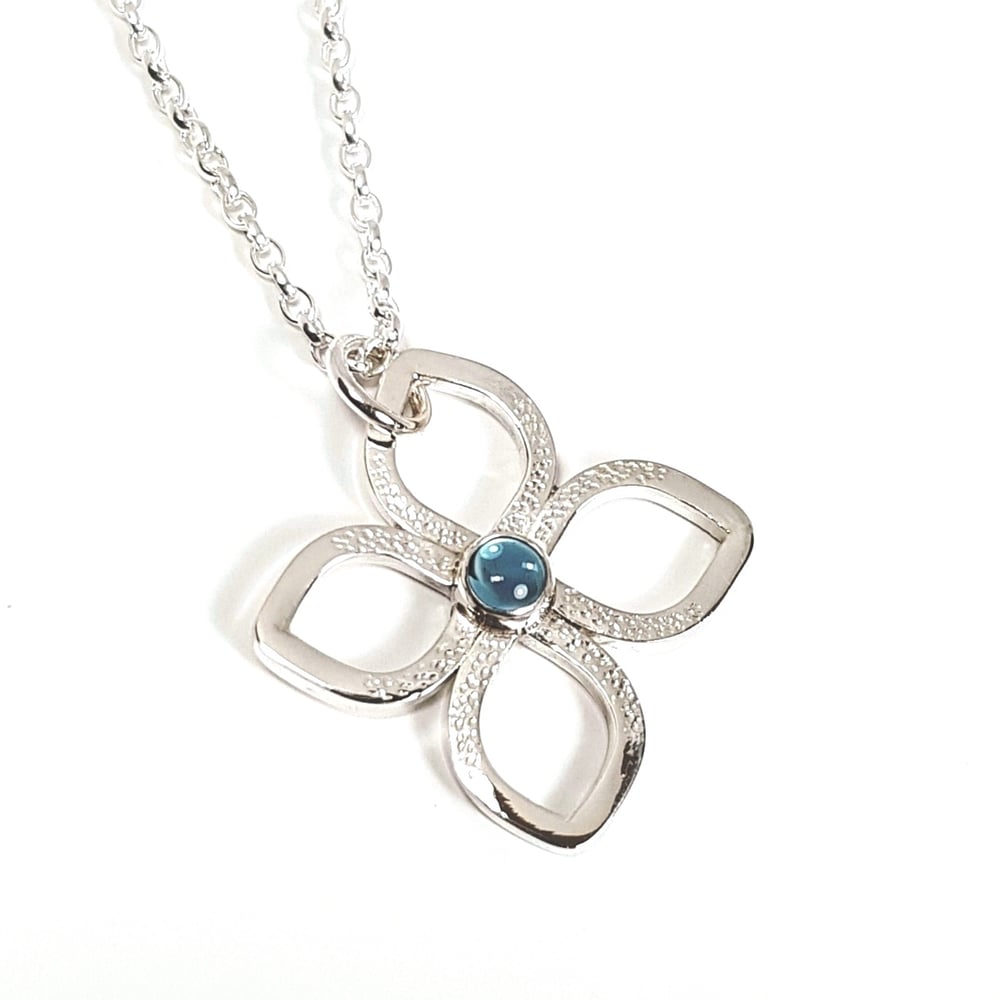 Image of Sterling Silver Flower Pendant Necklace, Blue Topaz Necklace, November Birthstone