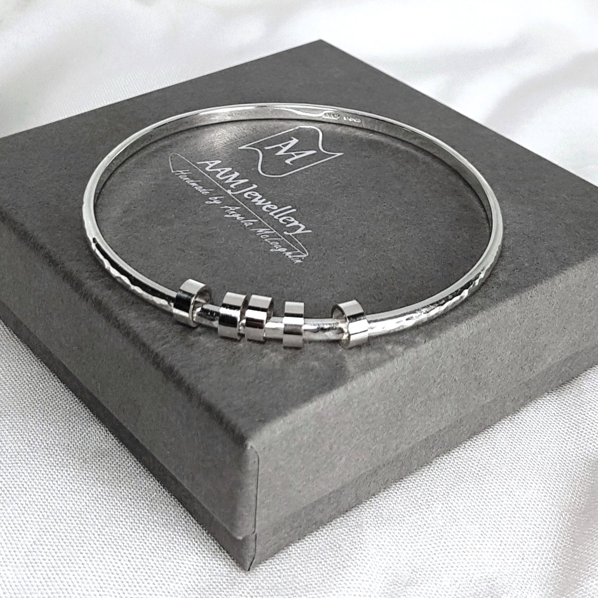 Image of Sterling Silver Bangle with Ring Charms, Hammered Solid Silver Charm Bracelet