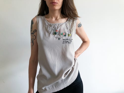 Image of Deception - hand embroidered upcycled top - silky fabric, one of a kind, size Small Medium 