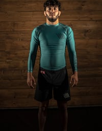 Image 1 of Flow Long Sleeve Rashguard (Emerald Green)