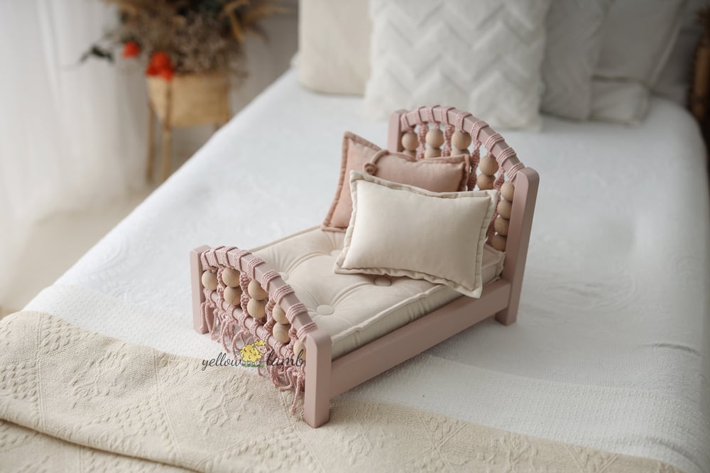 Image of « coral bed NB up to sitter in pink with tow sided mattress, two pillows and headband- pre order »