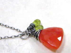 Image of perfect carnelian with peridot accents