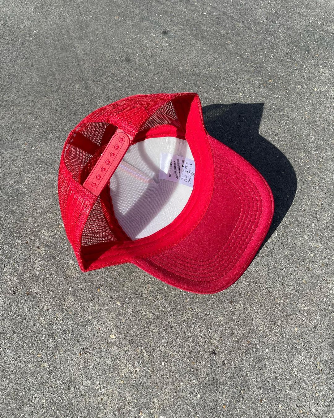 Image of Fire red heat reactive trucker hat