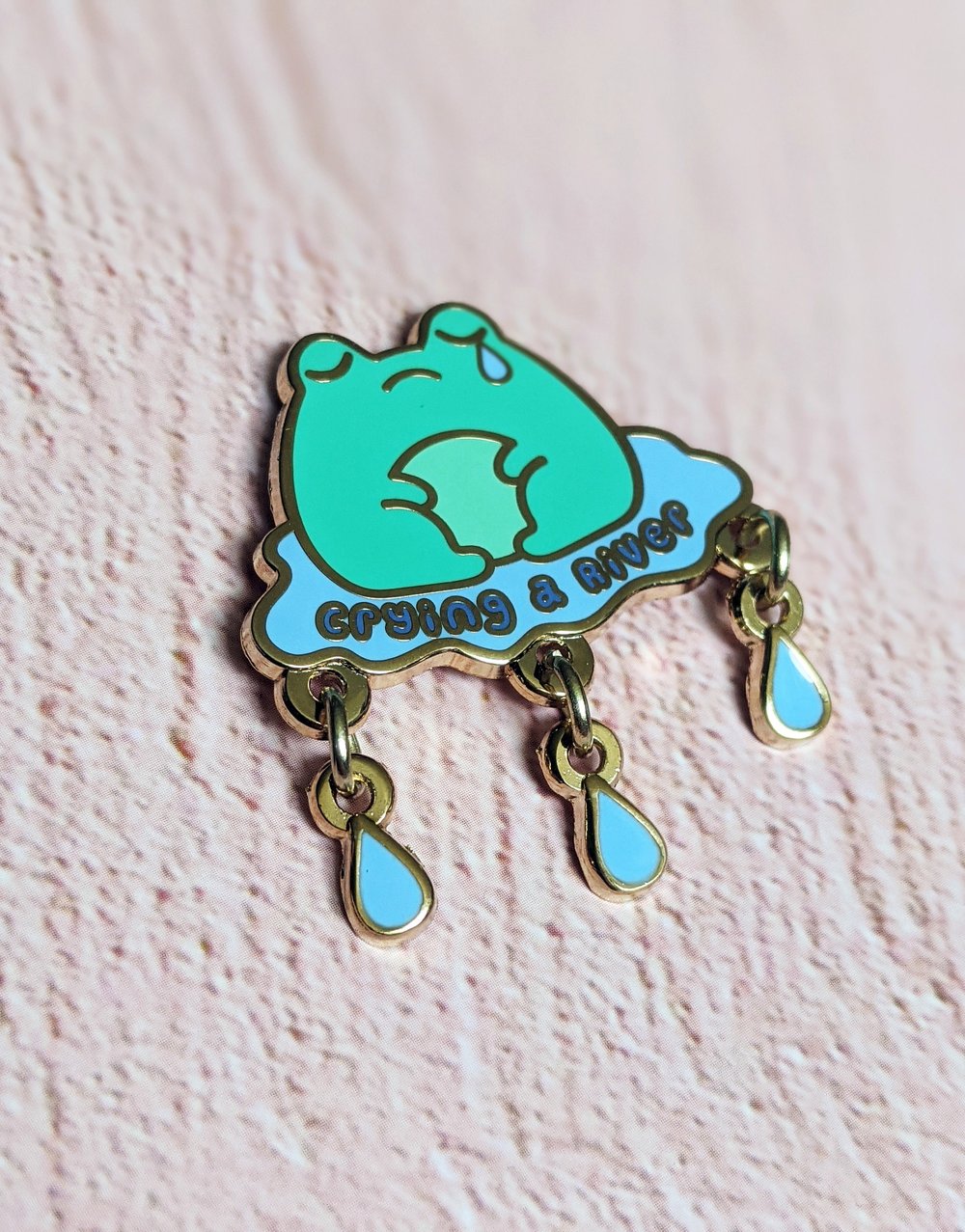 Image of Crying A River Frog Enamel Pin