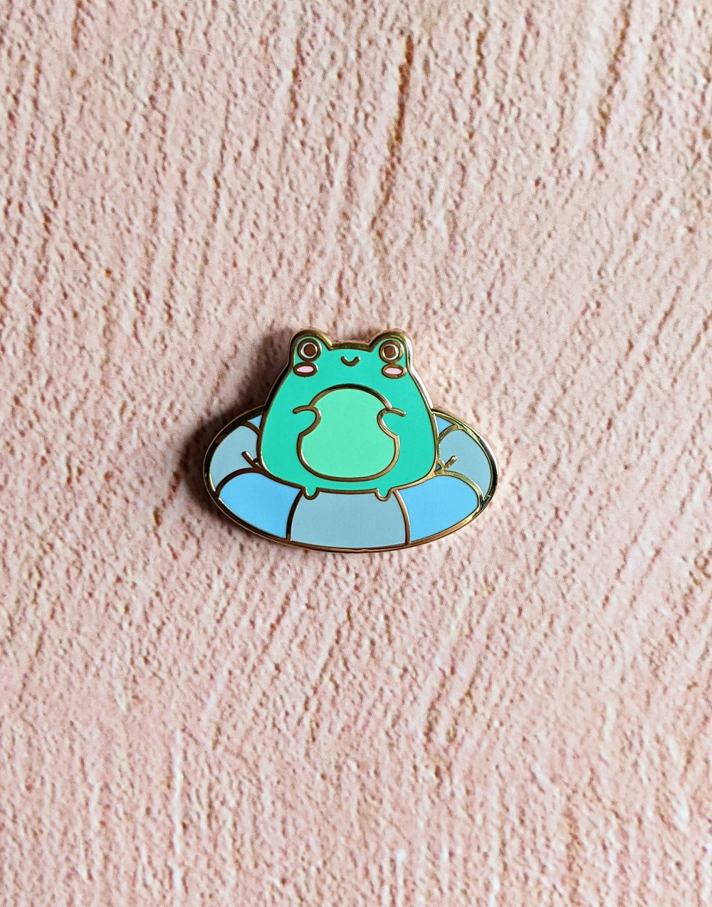 Image of Staying Afloat Frog Enamel Pin