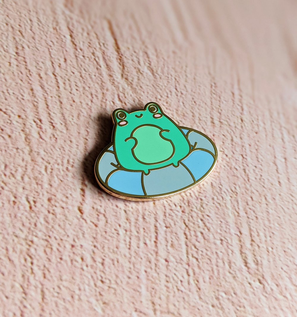 Image of Staying Afloat Frog Enamel Pin