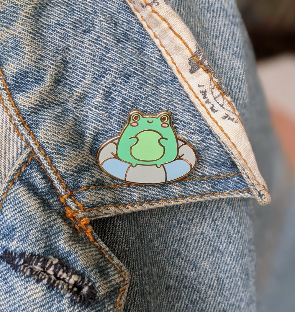 Image of Staying Afloat Frog Enamel Pin