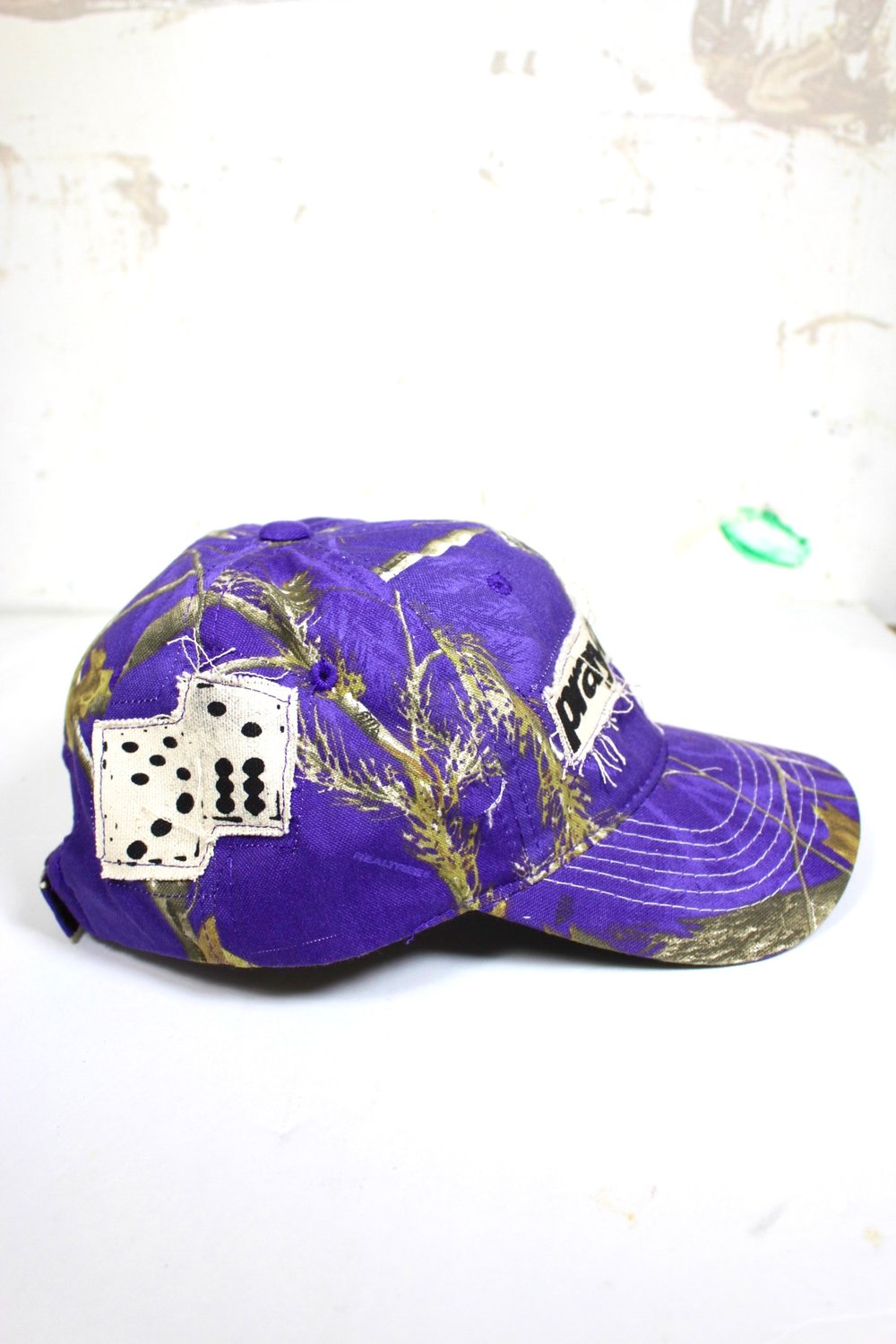 risks baseball cap in camo