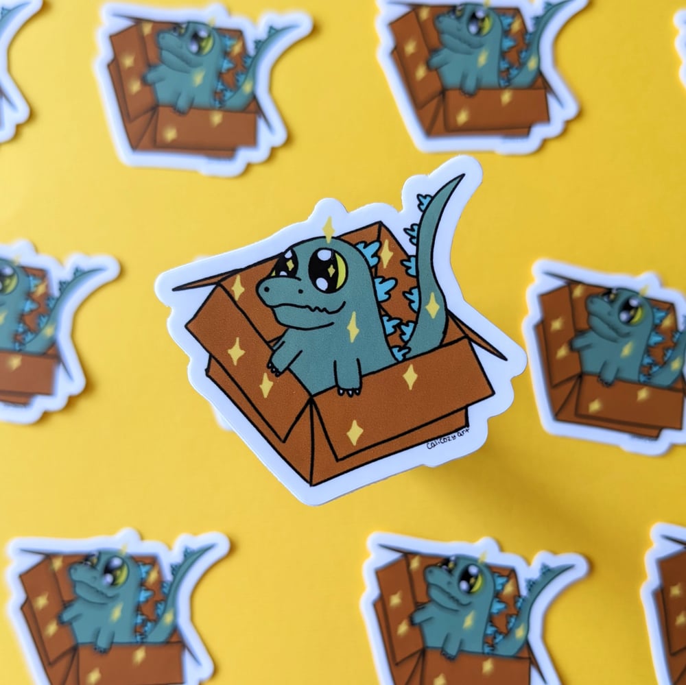 Image of Godzilla in a box sticker
