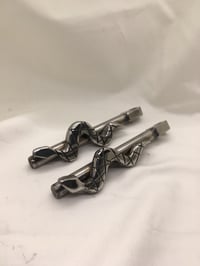Image 1 of Snake pegs
