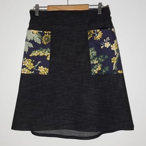 Image of Black denim flower pocket skirt