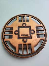 Image 1 of Nissan Cast Iron Trivet 