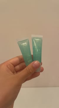 clear emerald butterfly gloss