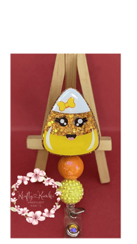 Image 1 of Candy corn badge reel