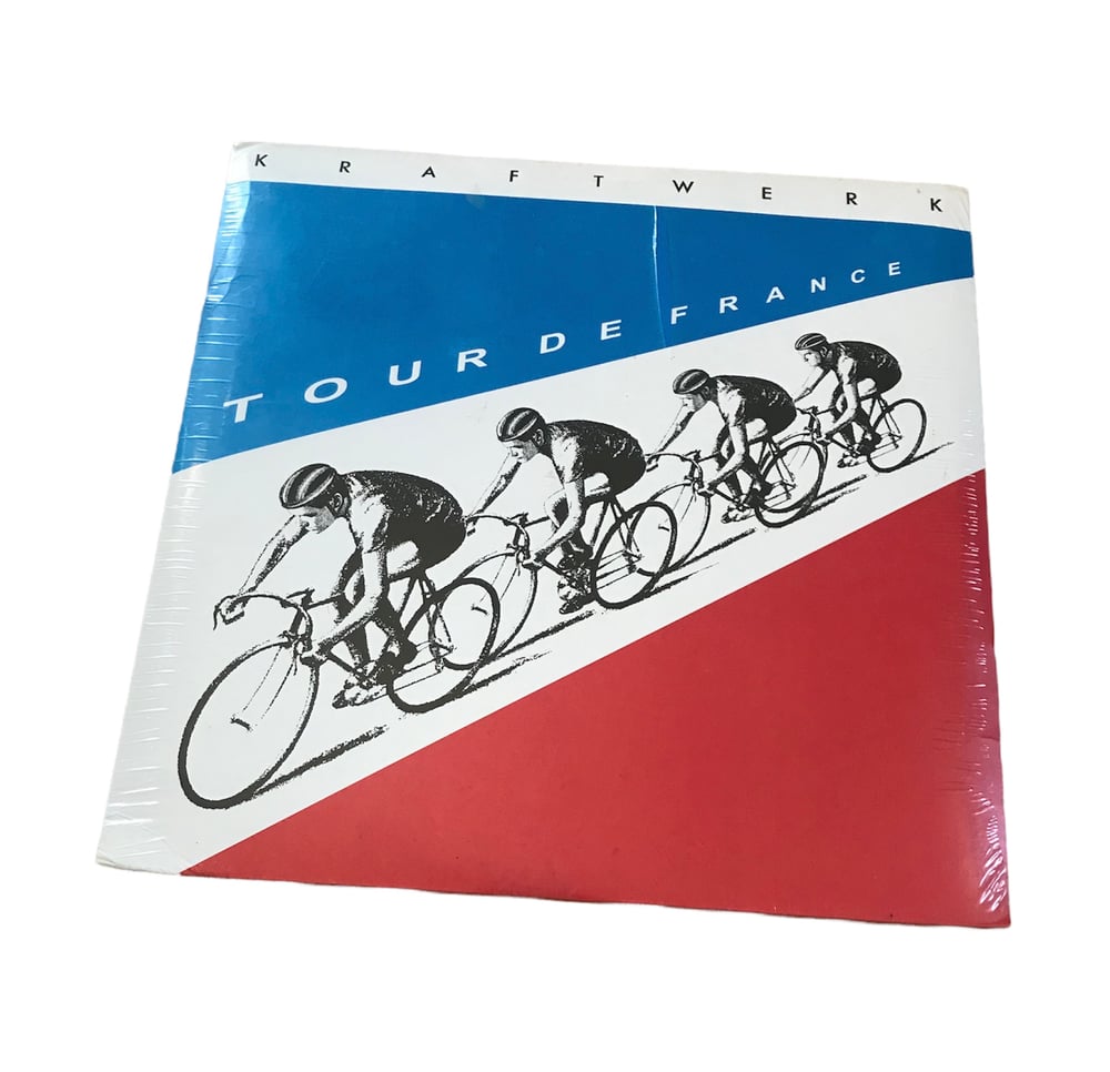 2003 Version / Original vinyl and sleeve of Kraftwerk’s 1983 hit Tour de France