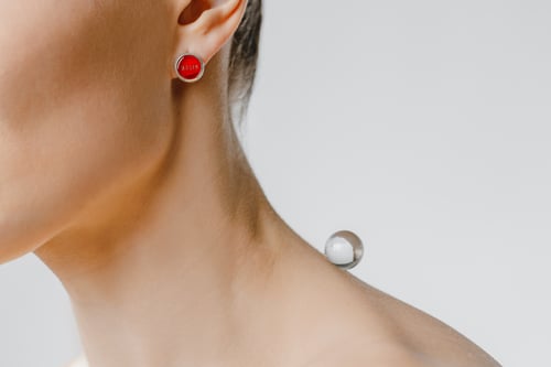 Image of "Light of the Sun" silver earrings with red plexiglass  · LUX SOLIS  ·