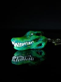 Image 1 of Sea slyle alligator skull with 3mm opal coin eyes