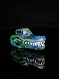 Image 1 of Mystery adventurine alligator skull pendant with 6mm opal coin eyes.