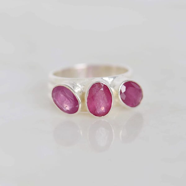 Image of Pink Ruby oval cut wide band silver ring