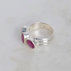 Image of Pink Ruby oval cut wide band silver ring