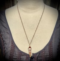 Image 1 of goddess with garnet 