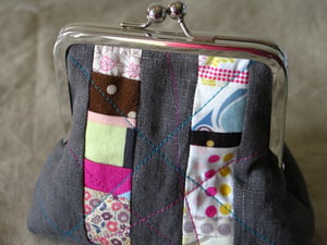 Image of patchwork strips fatty clutch