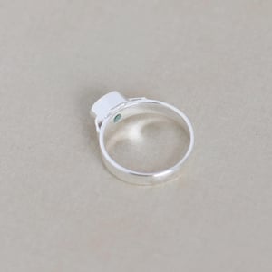 Image of Colombia Emerald oval cut flat band silver ring