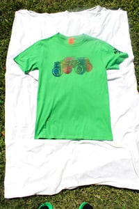 Image of jump over em tee in green 
