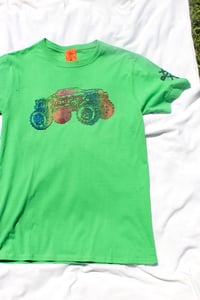 Image of jump over em tee in green 