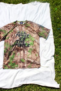 Image of the all power tee in forest camo