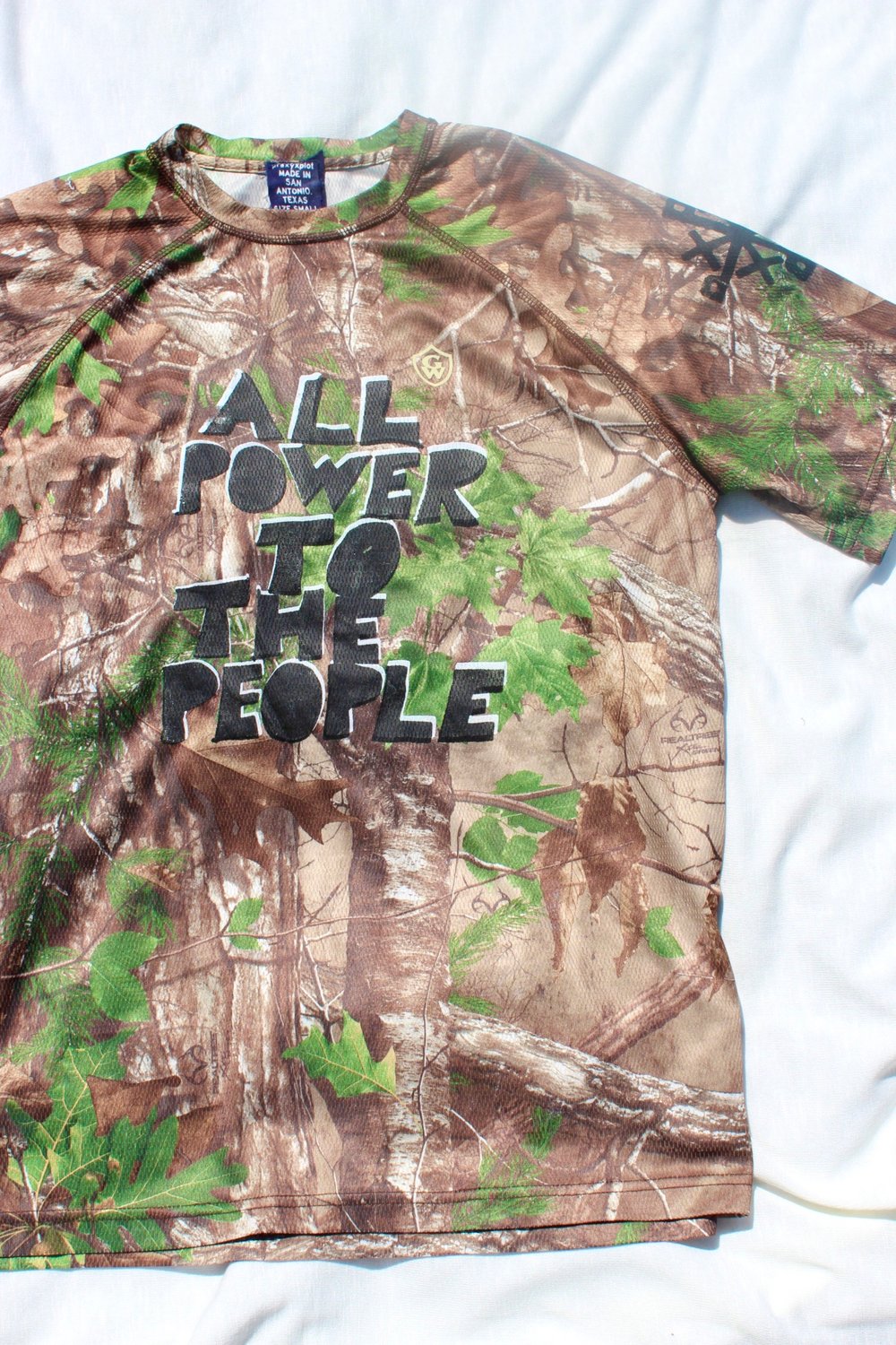 the all power tee in forest camo