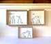 Image of Wire shadow box square: Maybe the cat?